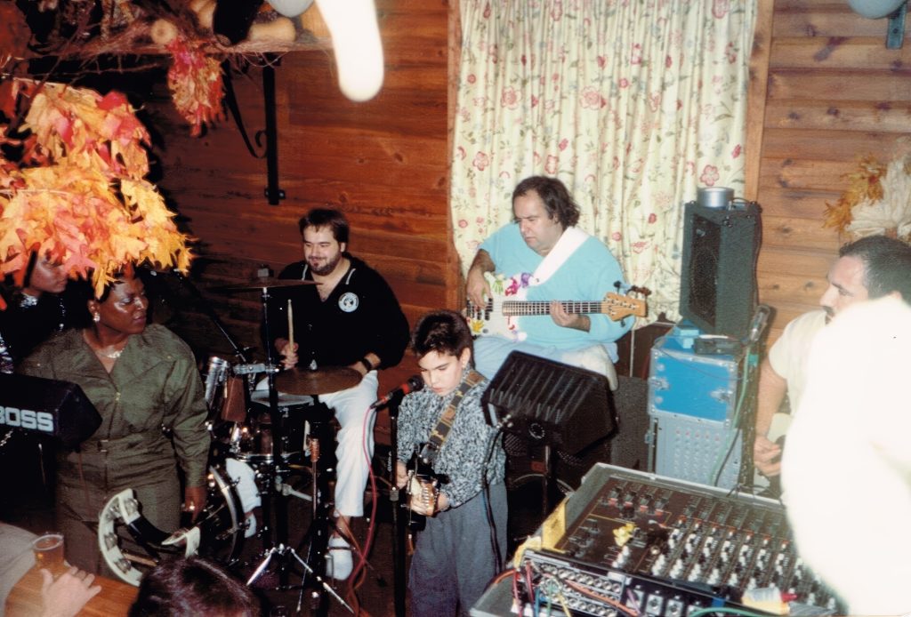 This is me sitting in with my dad's band Good n Plenty in Brooklyn, NY. L to R: Sharon Jones, Leo Portuesi, Me, Uncle Phil, Dad. Circa 1990